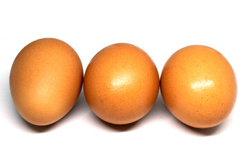 Triple ( 3  or Three ) Chicken Egg  isolated on white background - raw food ingredient object 