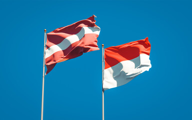 Beautiful national state flags of Latvia and Indonesia.