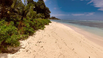 Aerial view of the beautiful coast of La Digue island, Seychelles © jovannig