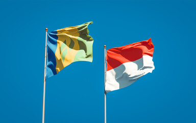 Beautiful national state flags of Saint Vincent and the Grenadines and Indonesia.