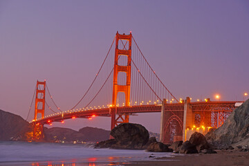 Fototapeta na wymiar Landscape view of famous Landmark Golden Gate Bridge is Red Bridge in evening seen from Marshall's Beach in San Francisco, California, United states , USA