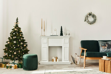 Stylish christmas living room interior with green sofa, white chimney, christmas tree and wreath,...