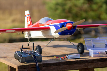 RC plane on a grassy runway