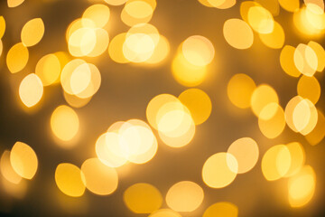 Blurry warm lights from wire garland background