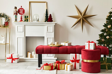 Christmas composition with beautiful decoration, christmas tree and wreath, deer, gifts and accessories in modern home decor. Template.