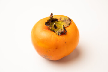 Persimmon fruit on white background