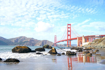 Golden Gate Bridge is Red Bridge seen from Baker Beach in San Francisco, California, United states , USA - Holiday Travel famous building Landmark - Nature Park and outdoor sightseeing