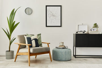 Modern retro concept of home interior with design grey armchair, coffee table, plants, mock up...