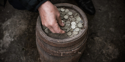 Concept of poverty, and destitution, money and coins. Poor people, need a help