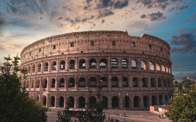 Fototapeta na wymiar road to Colosseum ancient arena under dramatic sky, Rome Italy