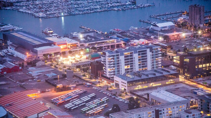 AUCKLAND, NZ - AUGUST 26, 2018: Aerial city view from Sky Tower. Auckland skyline at sunset