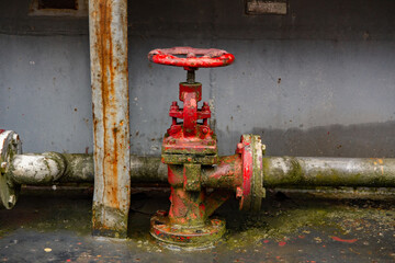 Old fire pipe system closeup fire hydrant detail. 