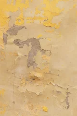 Fotobehang Verweerde muur Gele grunge abstracte textuur als achtergrond. Oude cementmuur met gele gebarsten verf