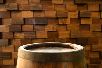 Fototapeta premium background of barrel and worn old table of wood