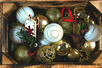 Christmas toys in a wooden box. Bright background for Christmas projects