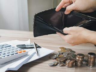bankruptcy economic financial concept. Person open his empty wallet without money to pay debt in...