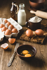 ingredients for baking, raw eggs in the bowl. 