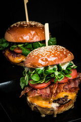 hamburgers on a black background 