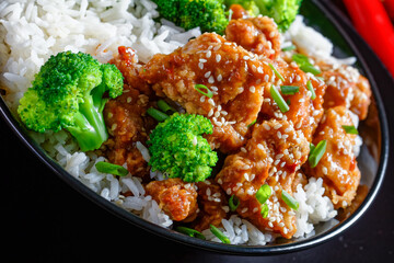 General Tso’s Chicken with rice in a bowl