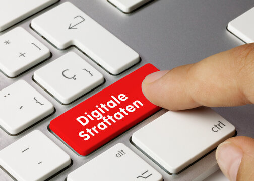 Digitale Straftaten - Wort auf roten taste.