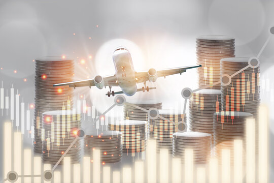 Airplane business recovery after covid-19 impact to airplane transport industry crisis concept and business travel idea. Stack of coins and growth graph on aircraft transportation background