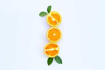 High vitamin C, Juicy and sweet. Fresh orange fruit with green leaves on white background.