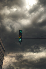 Traffic lights, city storm, dramatic clouds