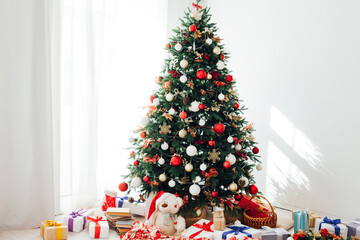 New year interior with Christmas tree with gifts decor garland December