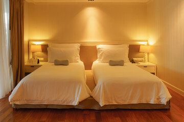 interior of hotel twin bedroom with full furnish
