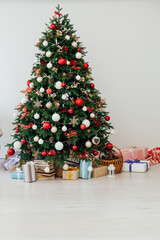 New year interior with Christmas tree with gifts decor garland December