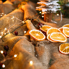 Dried orange slices in a basket with garland