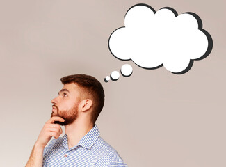 Side view of pensive young guy with empty thought cloud on light background, space for your design