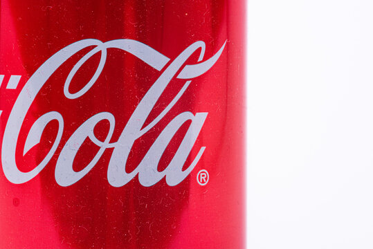 Gothenburg, Sweden - June 18 2019: Detail of a Coca Cola 33cl can on white background..