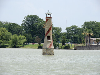 Lighthouse on the shore of a lake