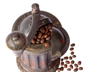 Close-up vintage coffee grinder and coffee beans isolate on white background