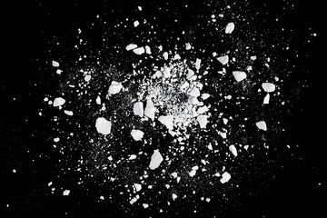 Rock stone broken splash explosion isolated on black background texture object design