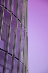 Purple office windows in the evening