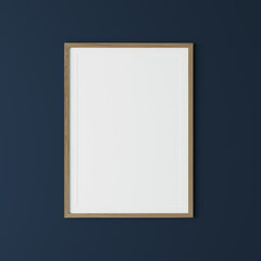 Vertical wooden frame on dark blue wall, poster frame mock up, 3d render