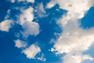 Blue sky with white clouds. Clear weather.