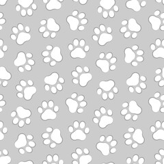 Cute pet prints seamless pattern. Paw background for pets, dog or cat. Foot puppy. Black silhouette shape paw. Footprint pet. Animal track. Trace dogs, cats. Design walks for print. Vector footprints
