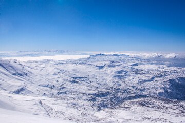 Fototapeta na wymiar View from Mzaar - Mount Hermon in the distance