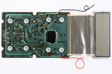 Electronic circuit board of an electronical calculator with many electrical components