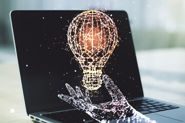Fototapeta na wymiar Creative idea concept with light bulb illustration on modern laptop background. Multiexposure