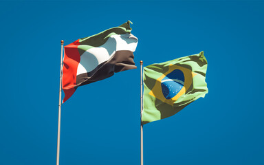 Beautiful national state flags of United Arab Emirates UAE and Brasil.