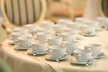 Obraz na płótnie Canvas a lot of tea mugs, top view of the tea pairs. Tea party