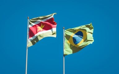Beautiful national state flags of Suriname and Brasil.