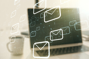 Creative abstract postal envelopes sketch on modern laptop background, e-mail and marketing concept. Double exposure