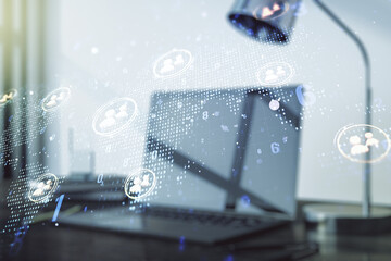 Double exposure of social network icons concept with world map and modern laptop on background. Marketing and promotion concept