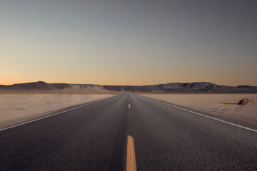 Fototapeta na wymiar panoramic view of hot summer road through the Nevada desert