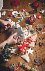 Woman create hand made christmas gifts